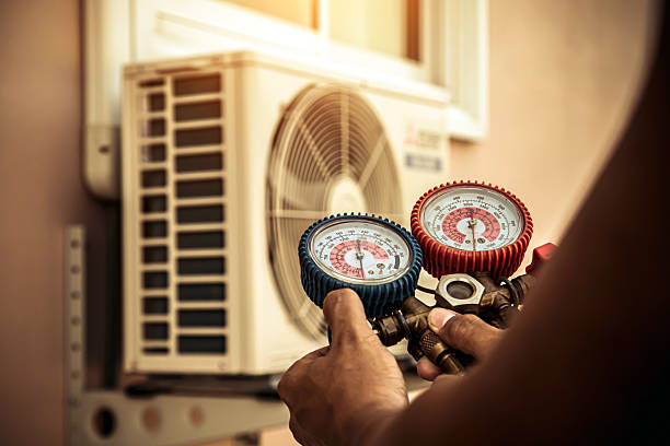 Professional Air Conditioning Service technician working in West Manchester, OH